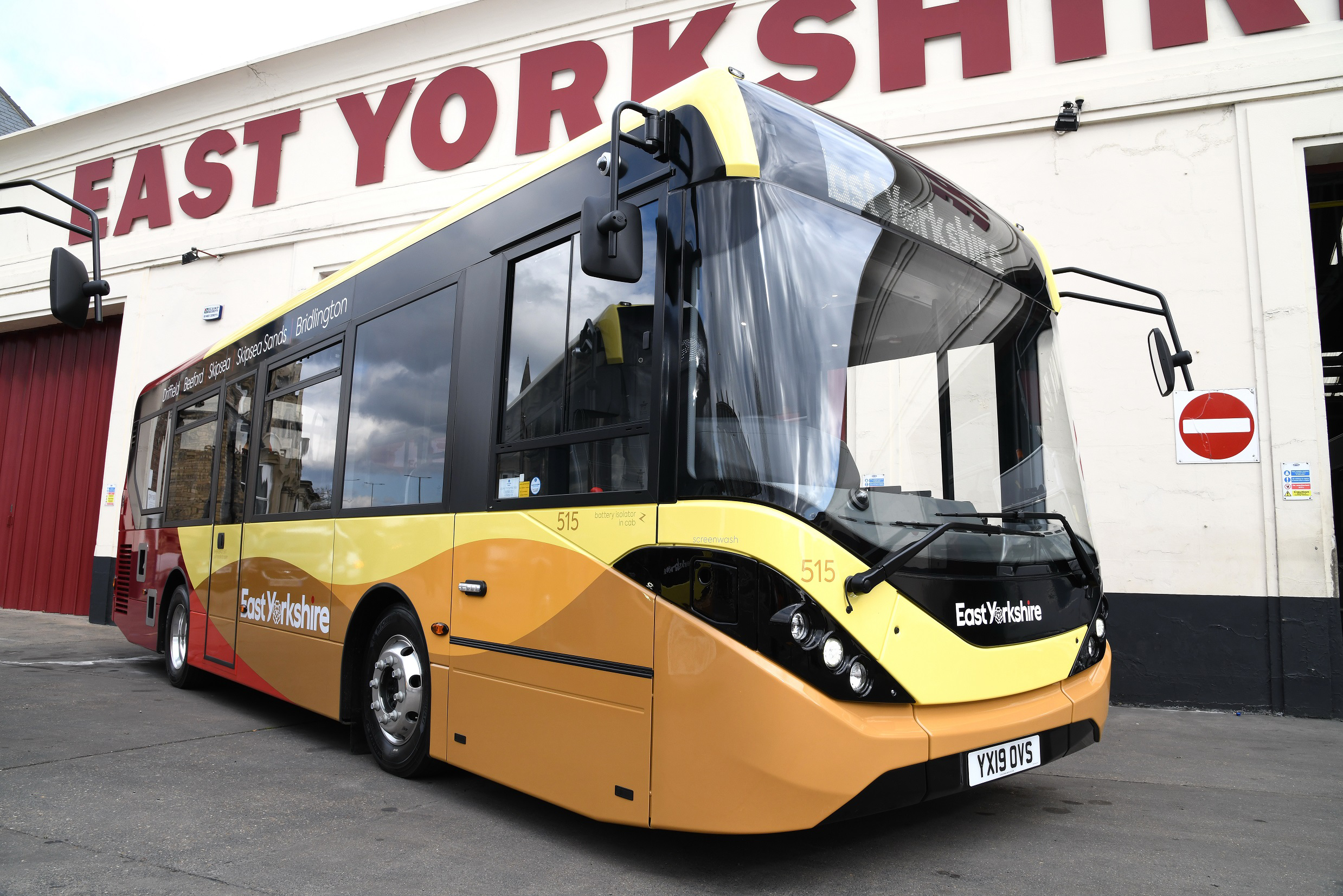 Single decker bus in front of sign that reads 'EAST YORKSHIRE'