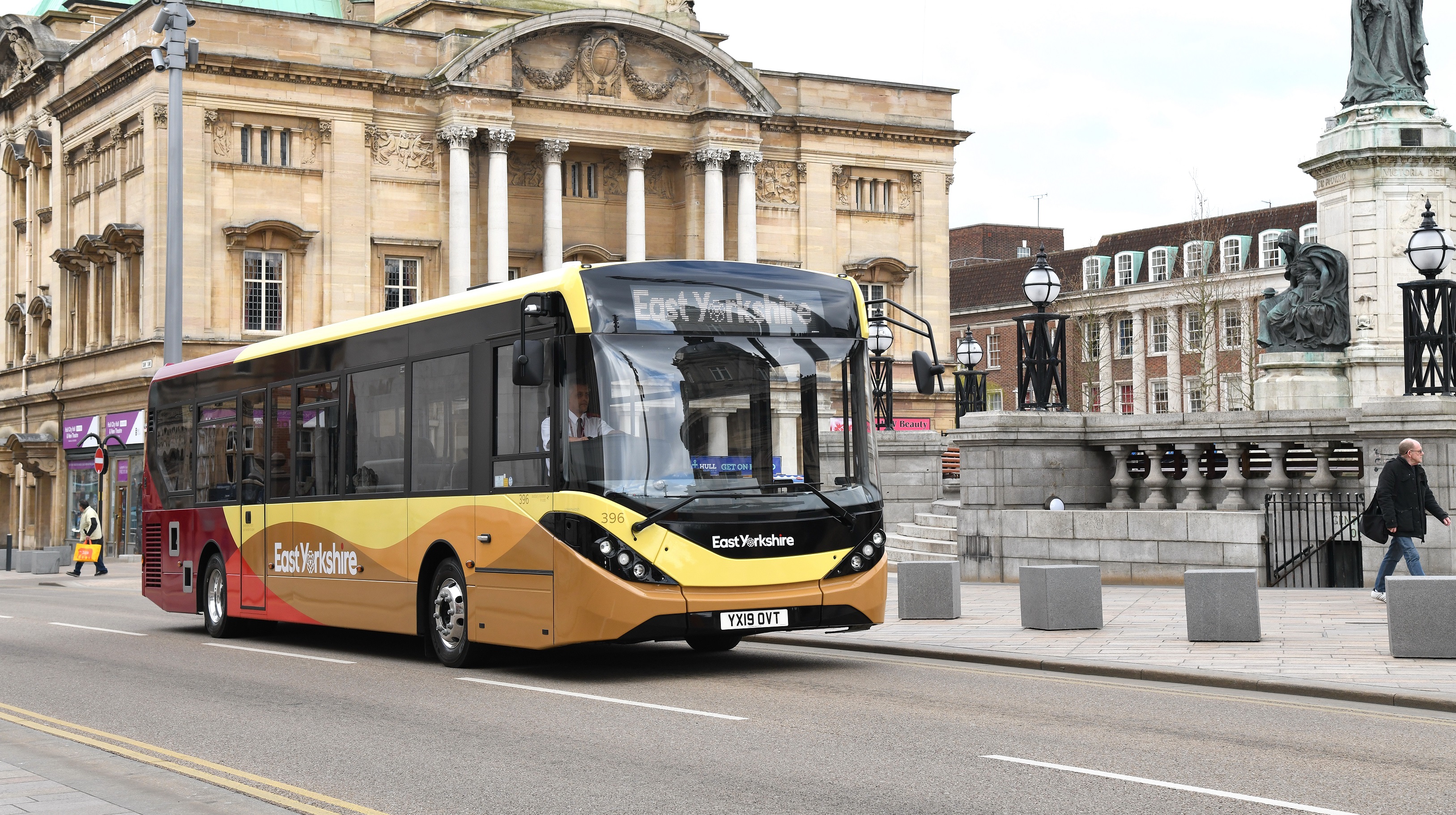 A single decker East Yorkshire Bus drives through Hull City Centre